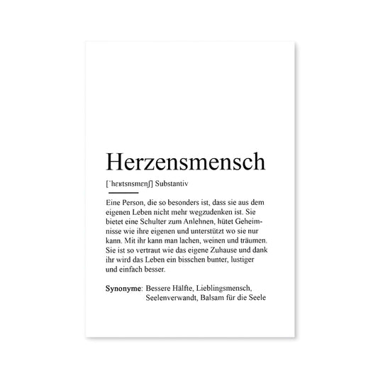 Postkarte mit Definition des Begriffs Herzensmensch von Kamewi. Schwarzer Text auf weißem Papier. Postkarte abgebildet vor weißem Hintergrund.